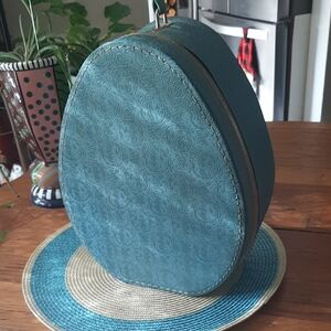 VTG Embossed Teardrop Travel Bag